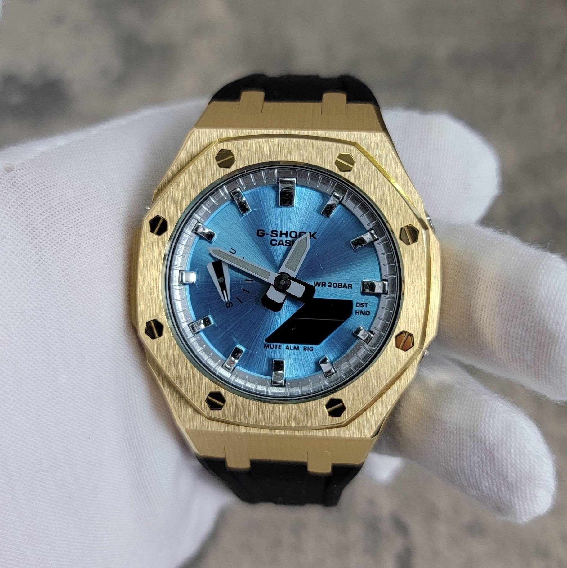 Casioak Mod Watch Gold Case Black Rubber Strap Silver Time Mark Ice Blue Dial 44mm- Casioak Mod Casio G-Shock Royal Oak Custom Mens Luxury Watches Ga2100