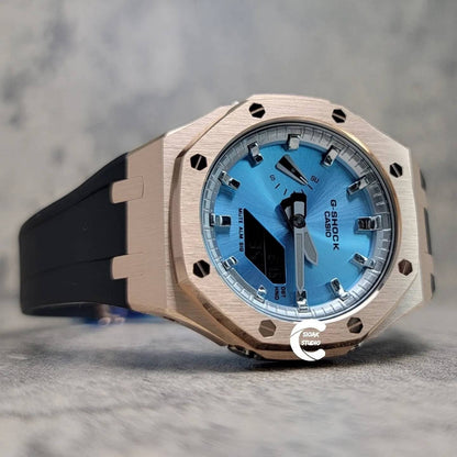 Casioak Mod Watch Rose Gold Case Black Rubber Strap Silver Time Mark Ice Blue Dial 44mm Gray- Casioak Mod Casio G-Shock Royal Oak Custom Mens Luxury Watches Ga2100